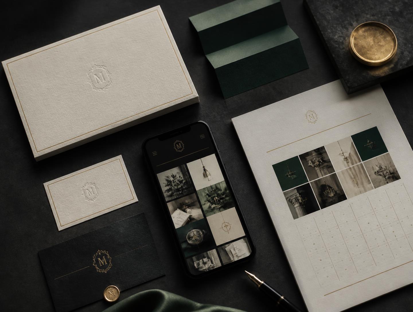 A brand system laid out with letterpress cards, colour swatches, a content grid on a phone and a content calendar